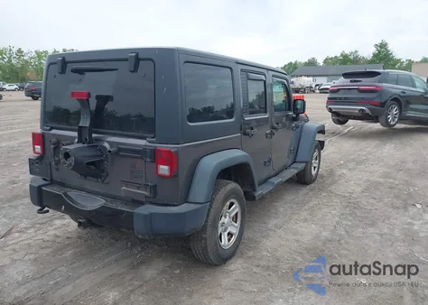 2014 Jeep Wrangler Unlimited Willys Wheeler из США, поврежденный, VIN 1C4BJWDG6EL293893